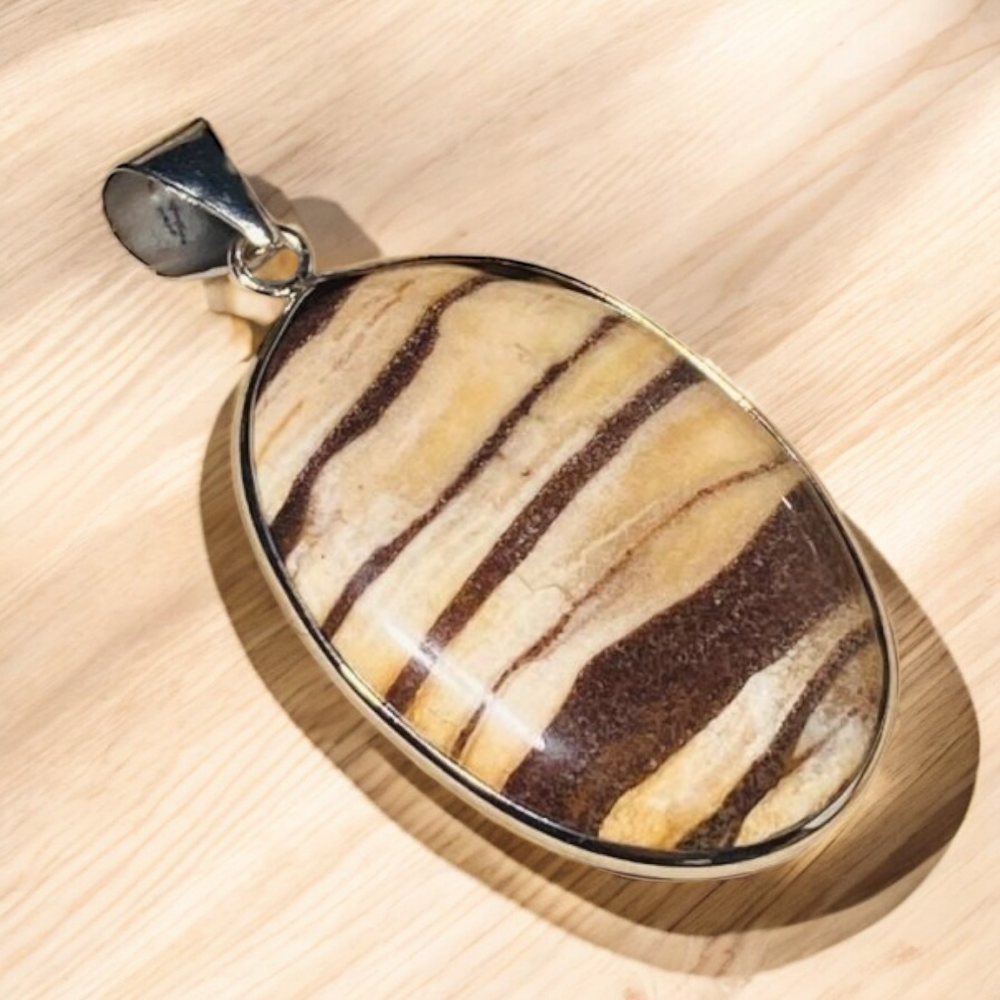 Zebra Jasper pendant approx. 25x35 mm silver-colored